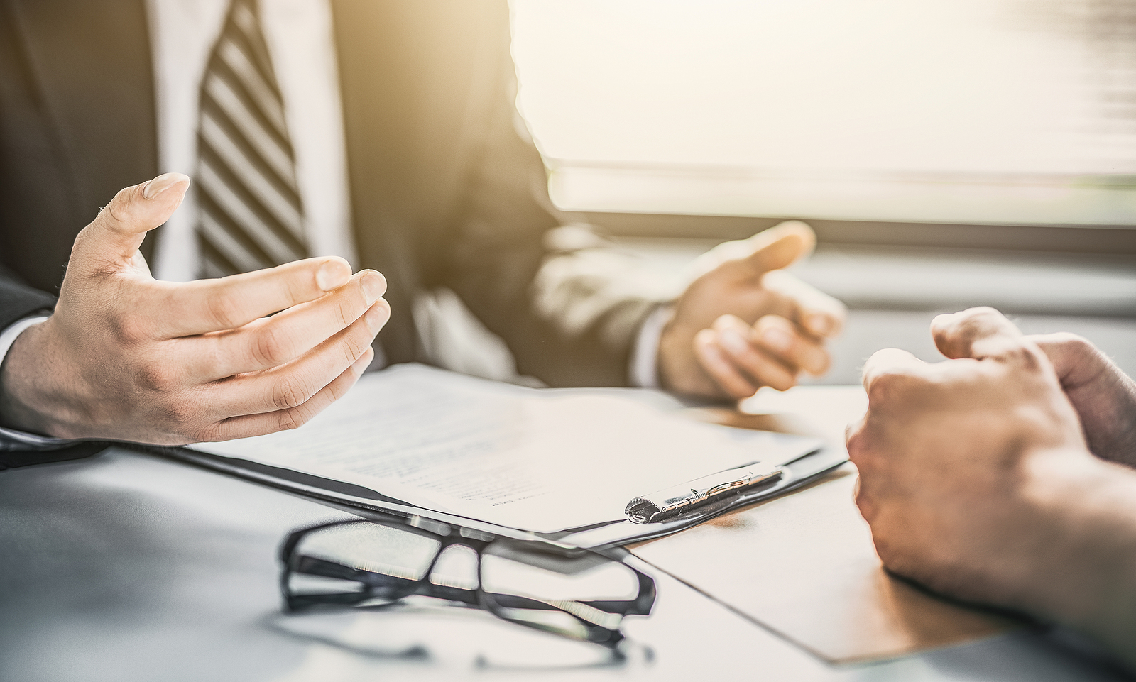 injury lawyer is discussing something with client injury attorney is discussing something with client